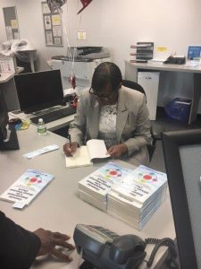Dr. Taylor signing books 2